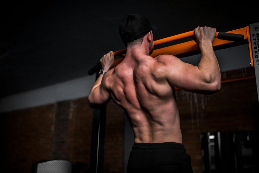 a man doing pull ups 