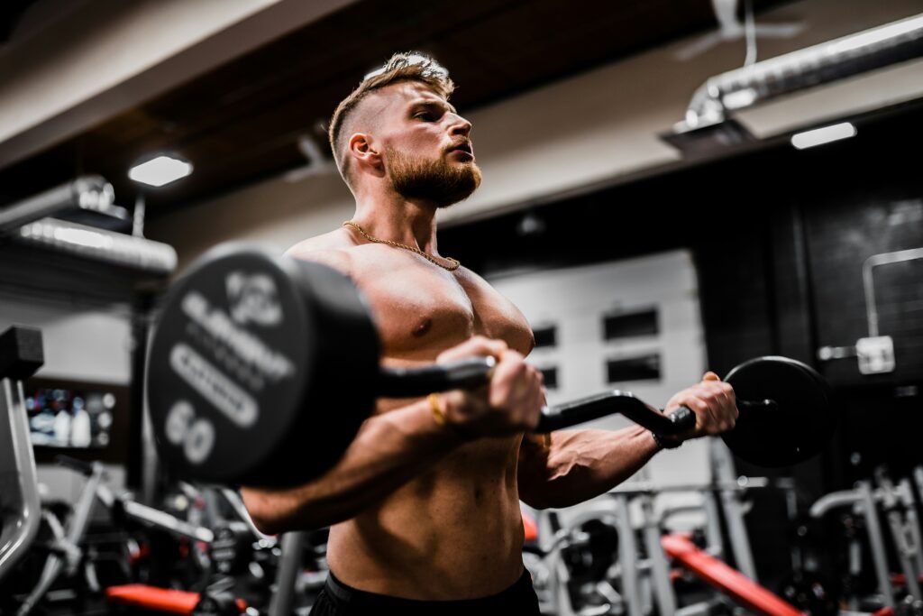 a man doing biceps curl 